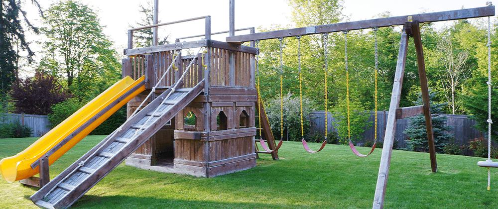 childrens play structure in back yard