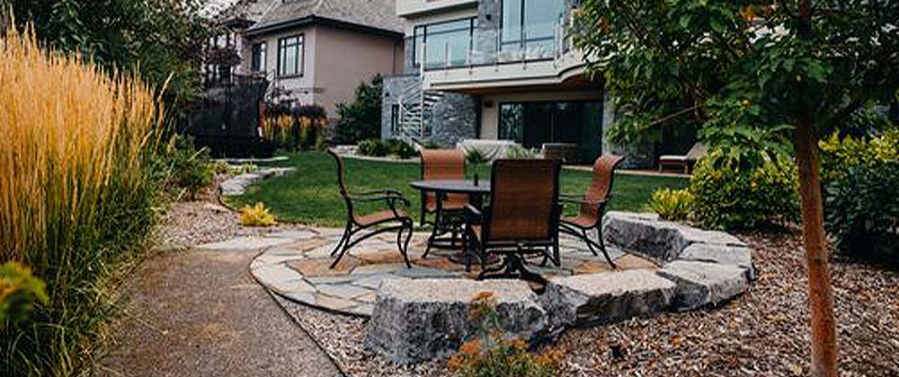 -landscape boulder enhance seating area salisbury landscaping